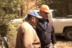 John consults with the representative from the power company